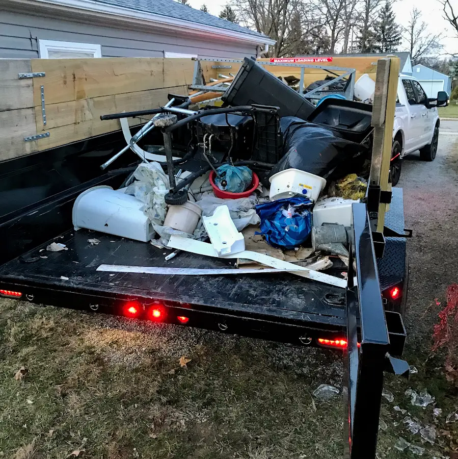 Roll-off dumpster delivered to a residential driveway in Jackson